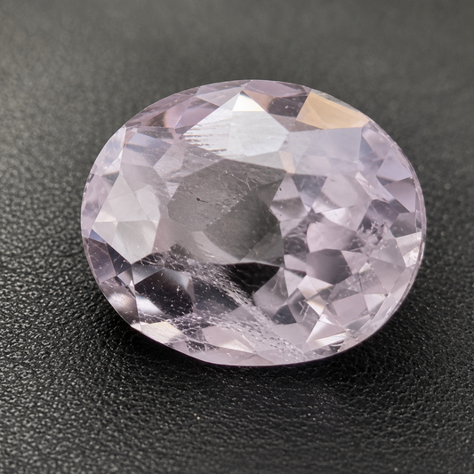 Spinello Grigio Naturale Ovale 0.55ct – Gemma Rara per Alta Gioielleria